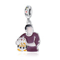 Man Holding a Puppy Charm