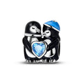 Winter Penguin Holding Heart Charm