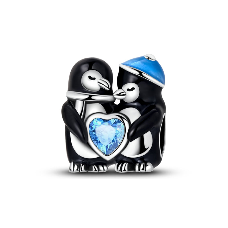 Winter Penguin Holding Heart Charm