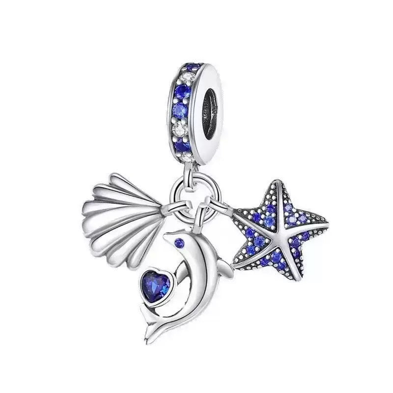 Seashell Dolphin and Starfish Charm, three silver dangles with blue stones