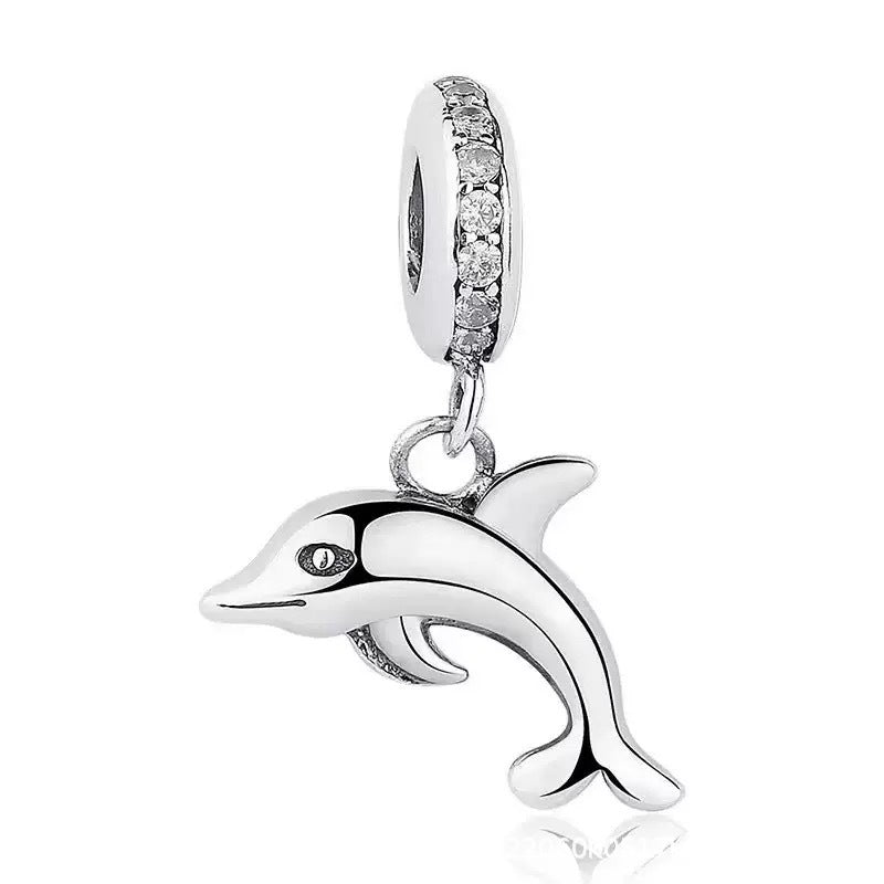 Sparkling Silver Dolphin Charm, polished silver dolphin on a crystal-set bail