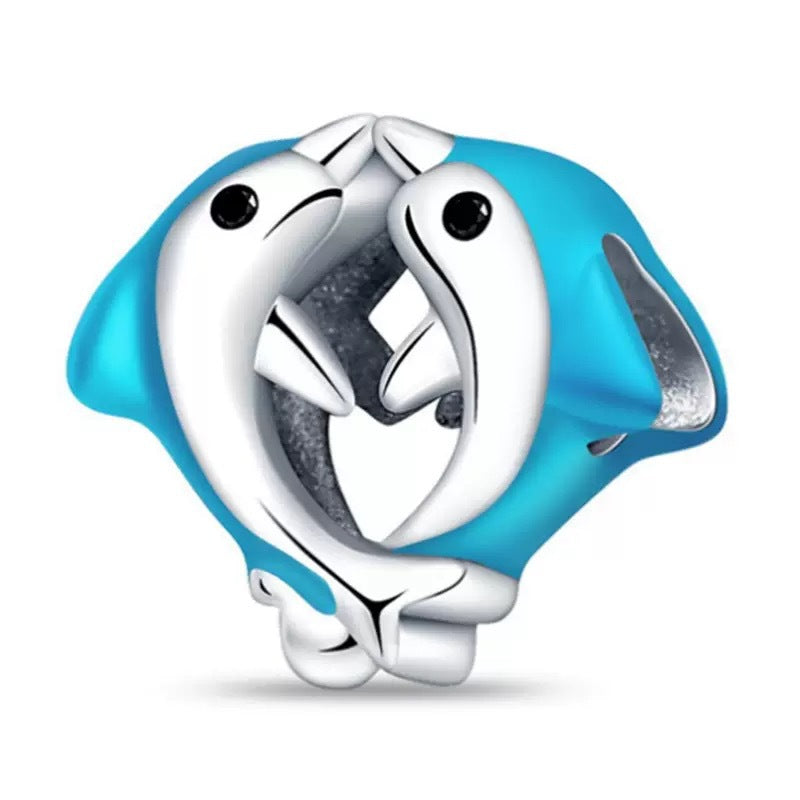 Kissing Dolphins Charm, two silver dolphins kissing on a blue enamel bead