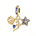 Gold Seashell Dolphin and Starfish Charm, three gold dangles with blue stones
