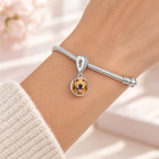 Personalized Custom Paw Photo Charm, worn on a snake style charm bracelet